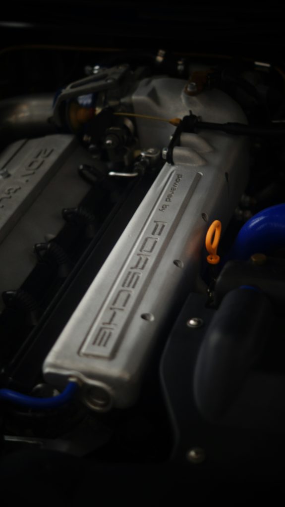 porsche check coolant level warning